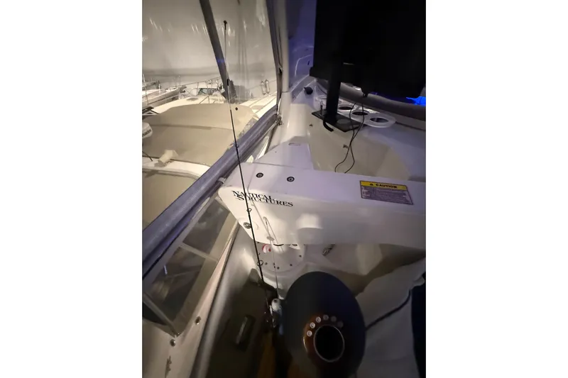 Orion Yacht Photos Pics 2004 Carver 460 Voyager interior with fishing rod and equipment.