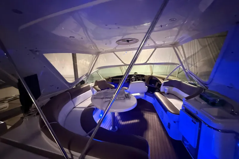 Orion Yacht Photos Pics Luxurious interior of 2004 Carver 460 Voyager yacht with ambient blue lighting.