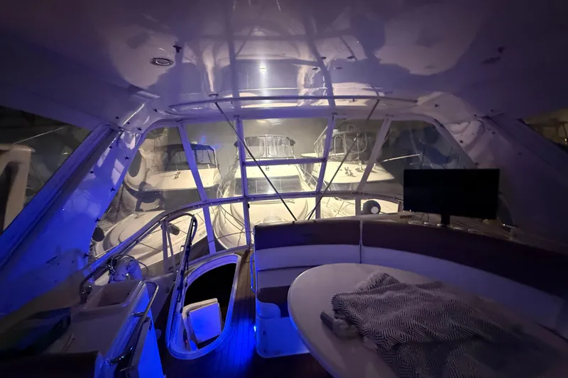 Orion Yacht Photos Pics Interior of a 2004 Carver 460 Voyager yacht with blue ambient lighting.