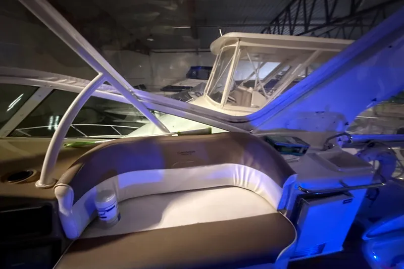 Orion Yacht Photos Pics Interior of a 2004 Carver 460 Voyager yacht with seating and helm station.