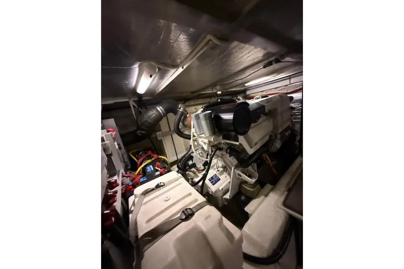 Orion Yacht Photos Pics Engine room of 2004 Carver 460 Voyager yacht, showcasing mechanical components and wiring.