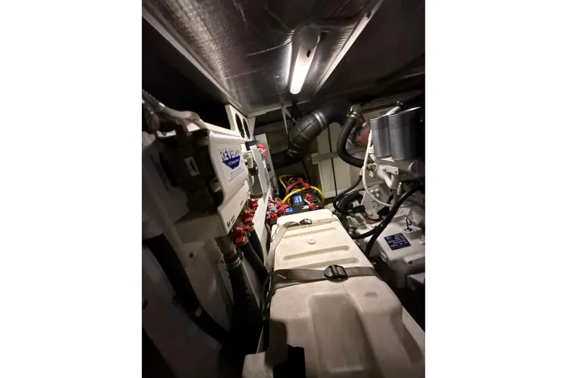 Orion Yacht Photos Pics Engine room of 2004 Carver 460 Voyager yacht, showcasing mechanical components.