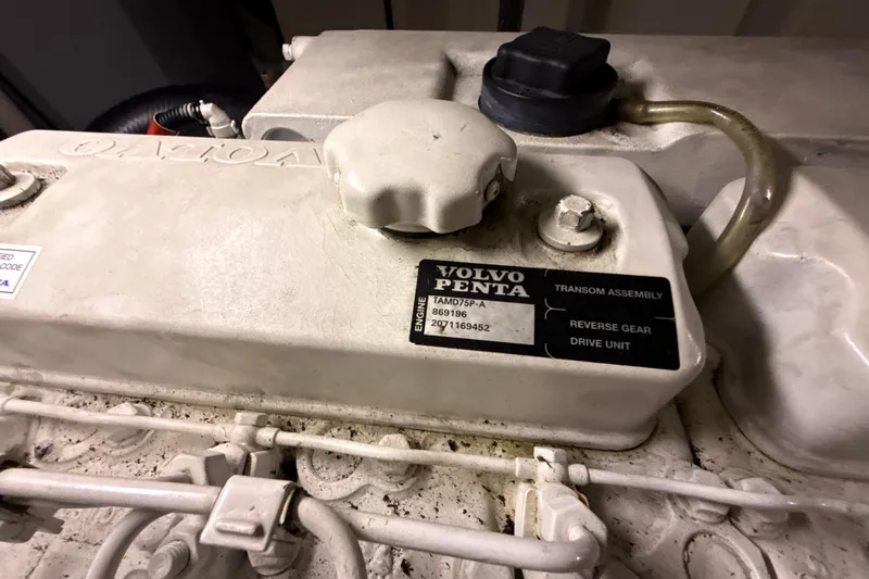 Orion Yacht Photos Pics Volvo Penta engine in 2004 Carver 460 Voyager, featuring transom assembly and drive unit.