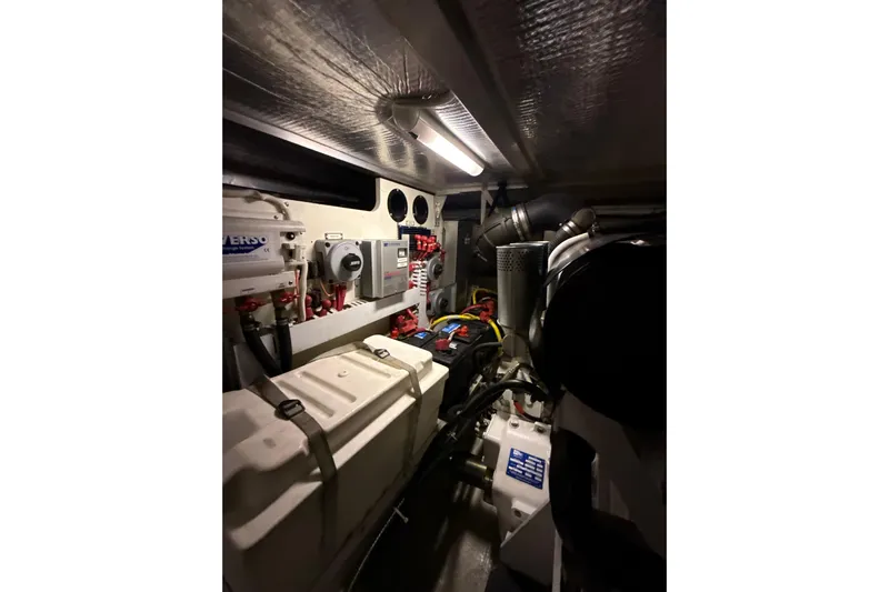 Orion Yacht Photos Pics Engine room of 2004 Carver 460 Voyager yacht, featuring mechanical components and wiring.