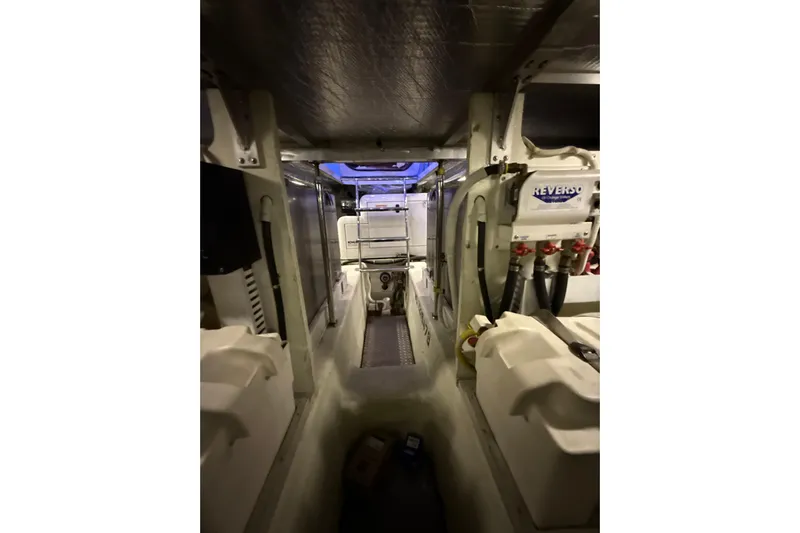 Orion Yacht Photos Pics Engine room of 2004 Carver 460 Voyager yacht, featuring Reverso oil change system.