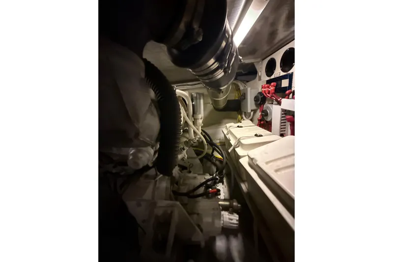 Orion Yacht Photos Pics Engine room of 2004 Carver 460 Voyager yacht, showcasing mechanical components and wiring.