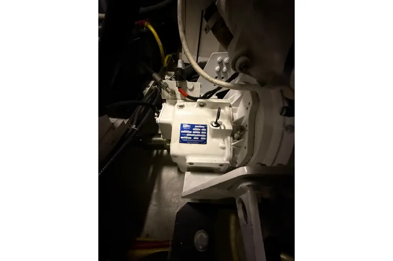 Orion Yacht Photos Pics Engine compartment of a 2004 Carver 460 Voyager yacht, featuring mechanical components.