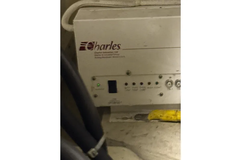 Orion Yacht Photos Pics Electrical panel in a 2004 Carver 460 Voyager boat, featuring Charles Industries equipment.