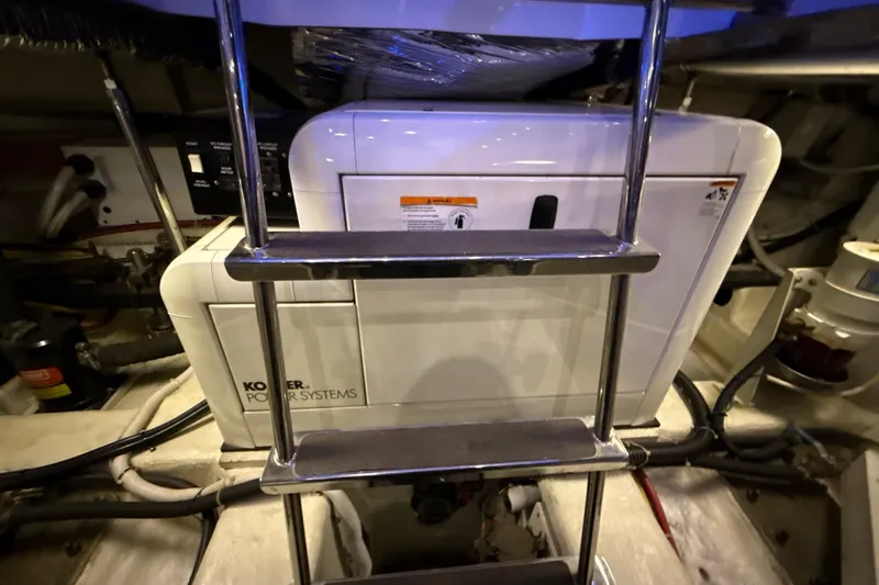 Orion Yacht Photos Pics Engine room of 2004 Carver 460 Voyager with Kohler power system.