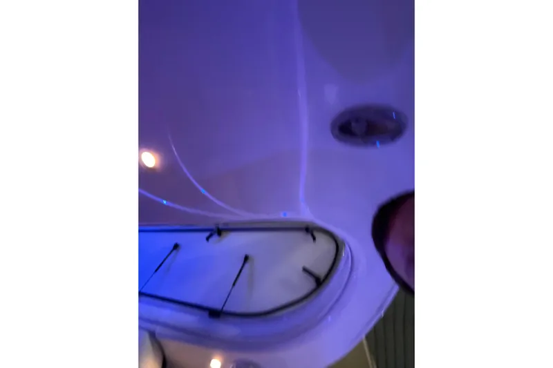 Orion Yacht Photos Pics Interior view of 2004 Carver 460 Voyager yacht with blue ambient lighting.