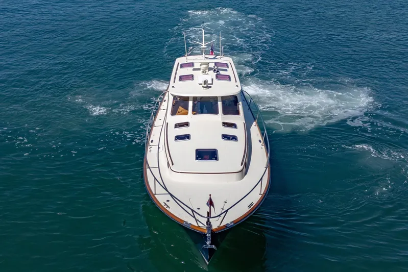 Maine Squeeze Yacht Photos Pics 2009 Hinckley Talaria 44 MY yacht cruising on open water.