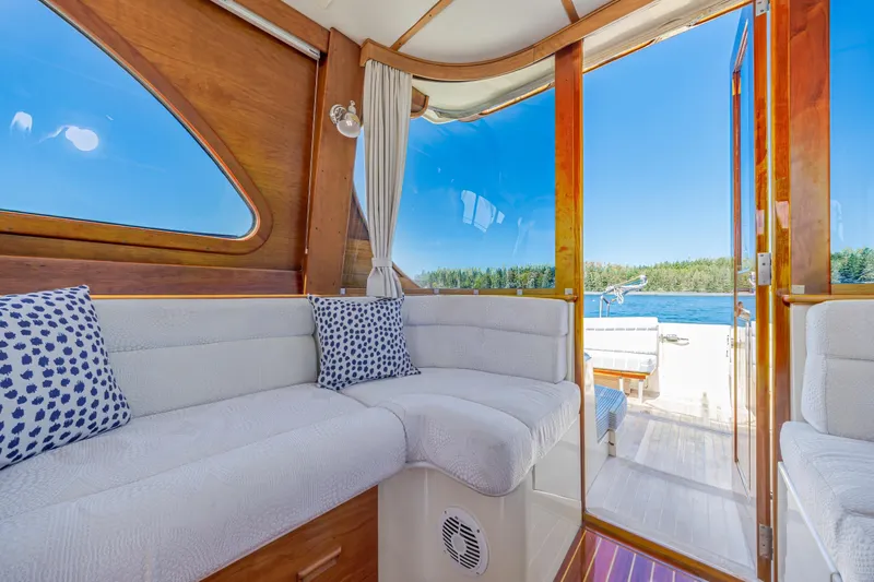 Maine Squeeze Yacht Photos Pics Luxurious interior of 2009 Hinckley Talaria 44 MY yacht with scenic water view.