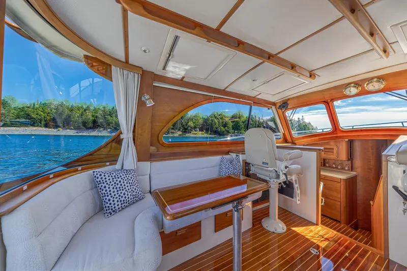 Maine Squeeze Yacht Photos Pics Luxurious interior of 2009 Hinckley Talaria 44 MY yacht with scenic water view.