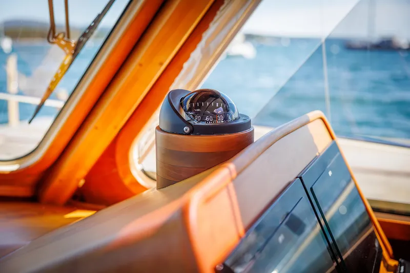 Maine Squeeze Yacht Photos Pics Compass on 2009 Hinckley Talaria 44 MY yacht, with ocean view through windows.