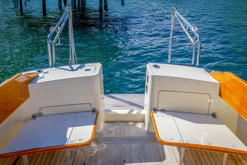 Maine Squeeze Yacht Photos Pics Hinckley Talaria 44 MY 2009 yacht deck with wooden accents and ocean view.