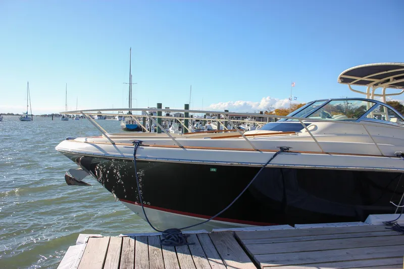Phoenix Yacht Photos Pics 2017 Chris-Craft Launch 38 docked at marina on sunny day.