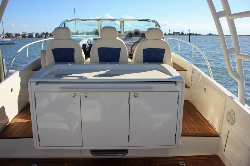 Phoenix Yacht Photos Pics 2017 Chris-Craft Launch 38 boat interior with seating and cabinetry on the water.