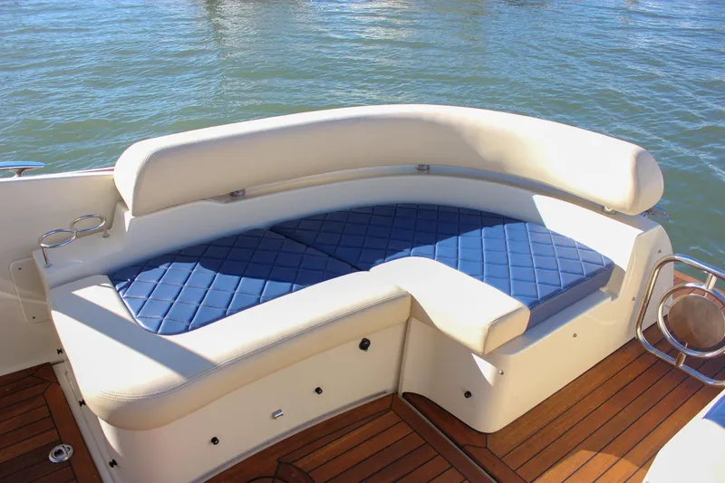 Phoenix Yacht Photos Pics 2017 Chris-Craft Launch 38 boat with elegant blue and white seating on teak deck.