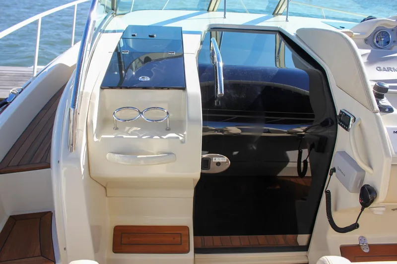 Phoenix Yacht Photos Pics 2017 Chris-Craft Launch 38 cockpit with sleek design and modern controls.