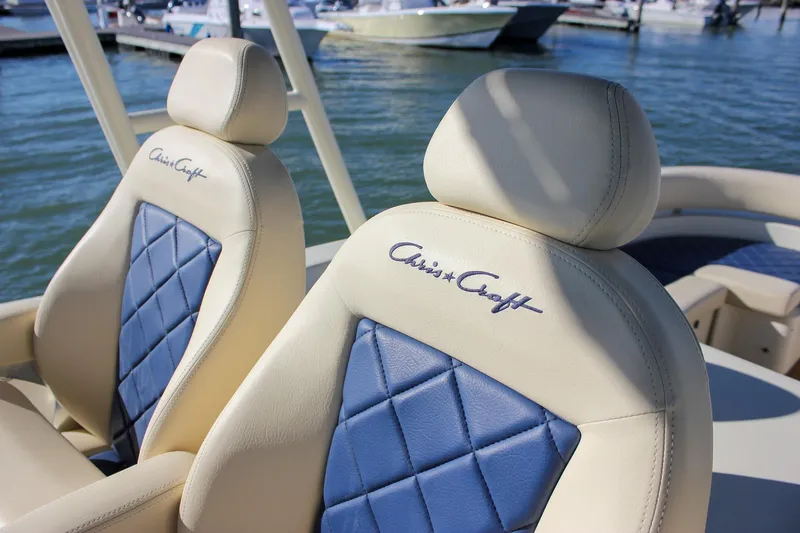 Phoenix Yacht Photos Pics Luxurious 2017 Chris-Craft Launch 38 boat seats with blue and cream upholstery.
