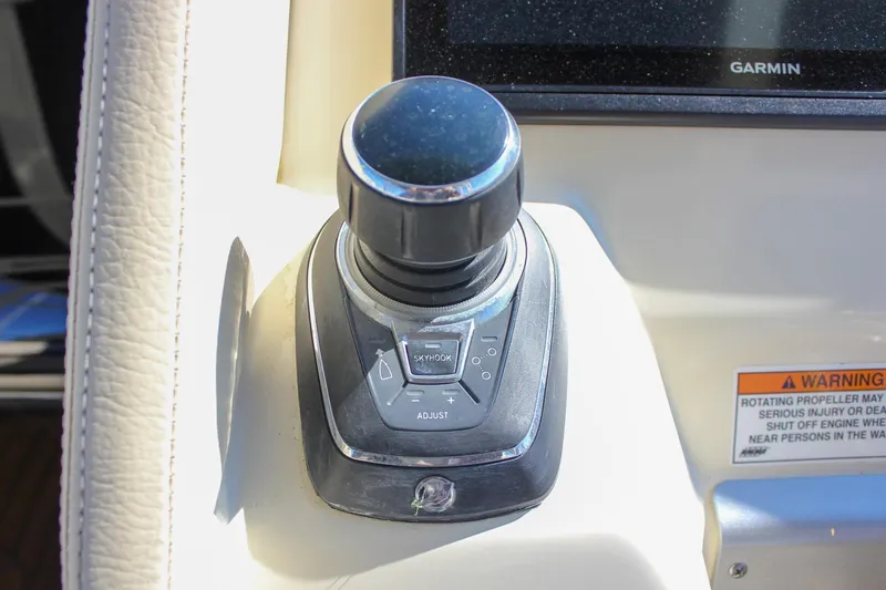 Phoenix Yacht Photos Pics Joystick control on 2017 Chris-Craft Launch 38 boat dashboard with Garmin display.