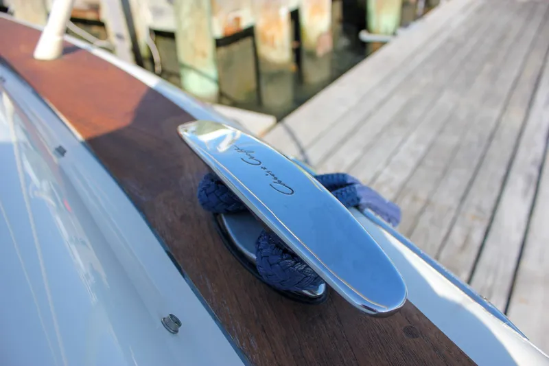 Phoenix Yacht Photos Pics 2017 Chris-Craft Launch 38 boat cleat with rope, dockside view.