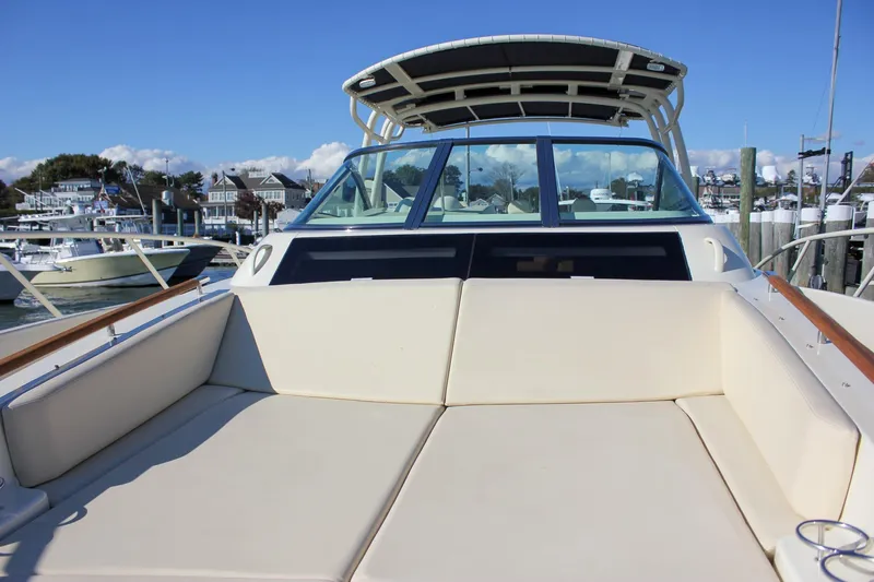 Phoenix Yacht Photos Pics 2017 Chris-Craft Launch 38 boat with spacious seating at a marina.