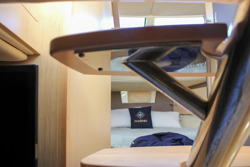 Phoenix Yacht Photos Pics Interior of 2017 Chris-Craft Launch 38, featuring a cozy cabin with modern design.