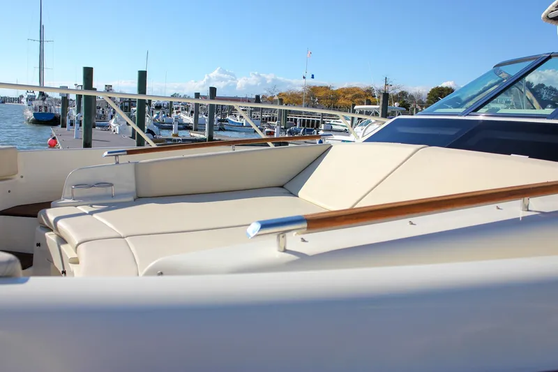 Phoenix Yacht Photos Pics 2017 Chris-Craft Launch 38 boat with luxurious seating at a marina.