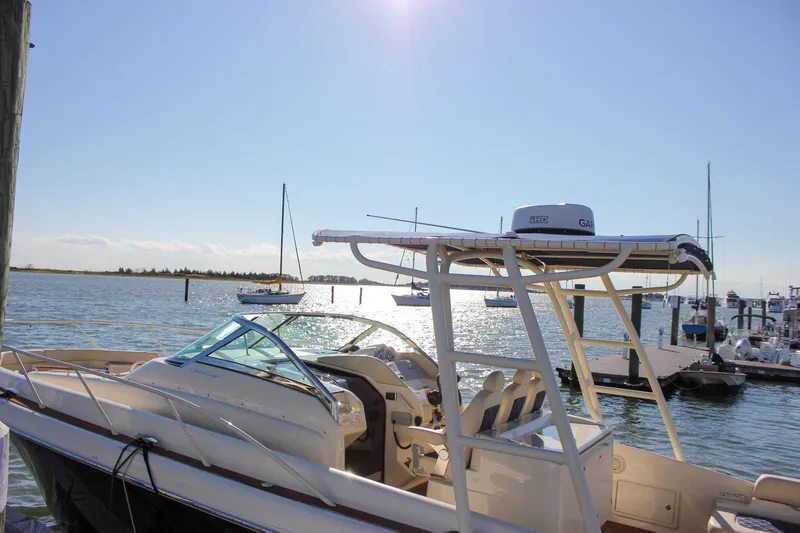Phoenix Yacht Photos Pics 2017 Chris-Craft Launch 38 boat docked at a sunny marina.