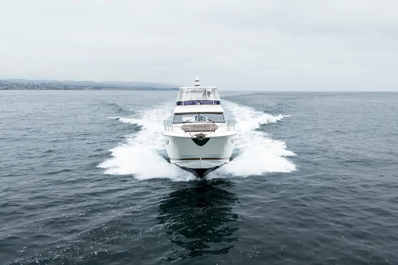 Seeworthy Yacht Photos Pics 2018 Prestige 560 yacht cruising on open sea, front view.