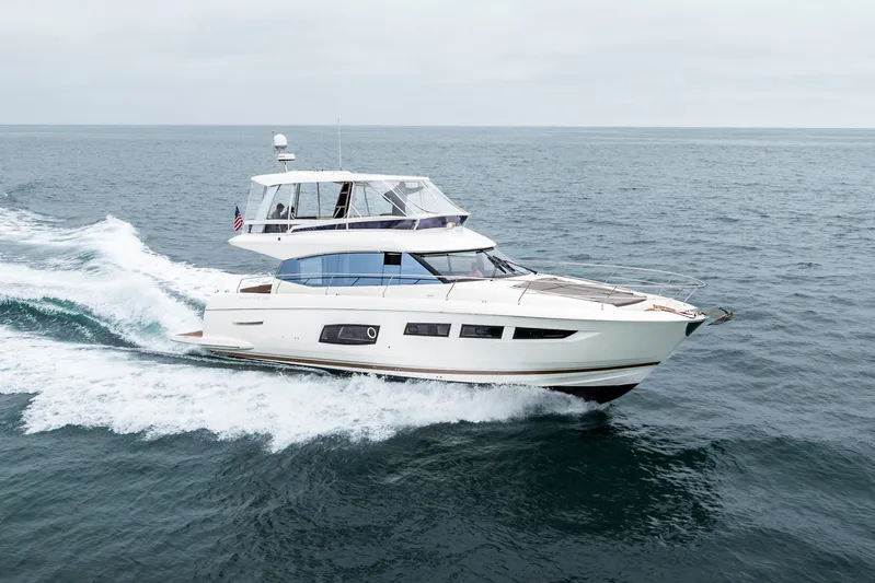Seeworthy Yacht Photos Pics 2018 Prestige 560 yacht cruising on open sea, showcasing sleek design and luxury features.