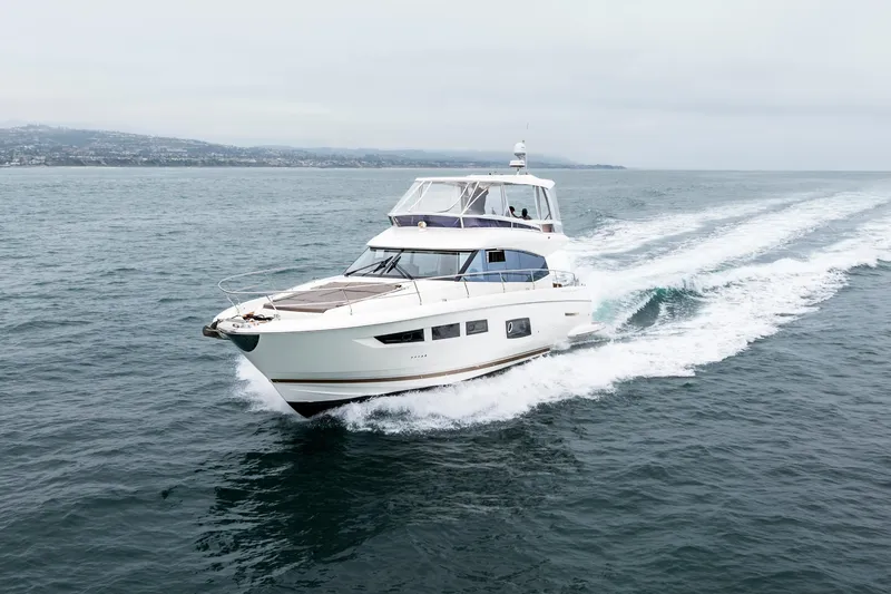 Seeworthy Yacht Photos Pics 2018 Prestige 560 yacht cruising on open water, showcasing sleek design and luxury features.