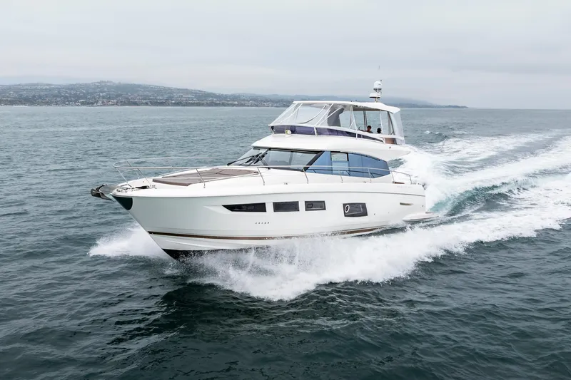 Seeworthy Yacht Photos Pics 2018 Prestige 560 yacht cruising on open water, showcasing sleek design and luxury.