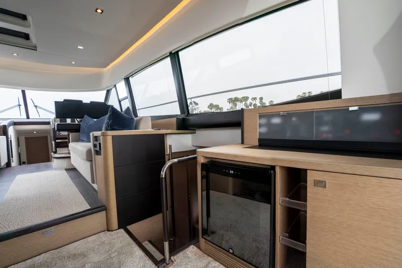 Seeworthy Yacht Photos Pics Luxurious interior of 2018 Prestige 560 yacht with modern furnishings and sleek design.