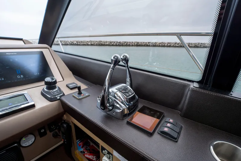 Seeworthy Yacht Photos Pics Control panel of a 2018 Prestige 560 yacht with navigation equipment.