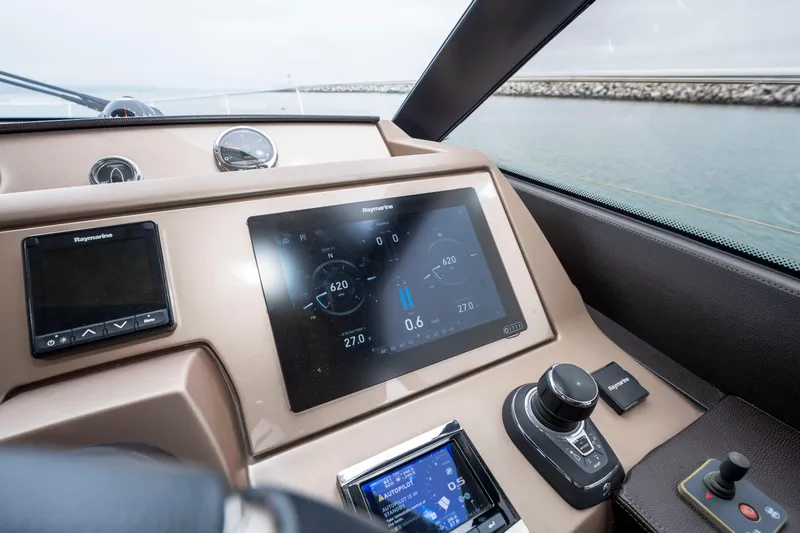 Seeworthy Yacht Photos Pics Control panel of 2018 Prestige 560 yacht with navigation displays and controls.