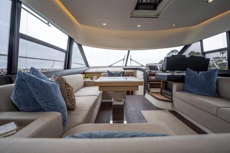 Seeworthy Yacht Photos Pics Luxurious interior of 2018 Prestige 560 yacht with plush seating and modern design.