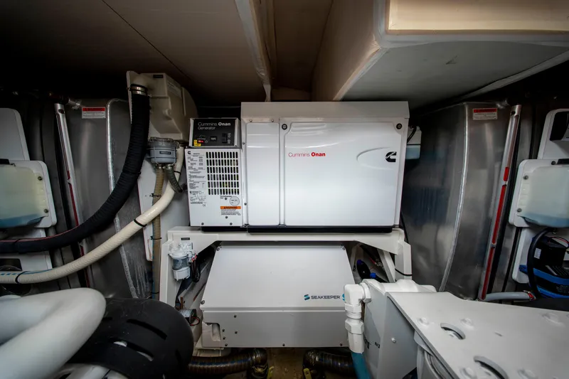 Seeworthy Yacht Photos Pics Engine room of 2018 Prestige 560 yacht with Cummins Onan generator and Seakeeper stabilizer.