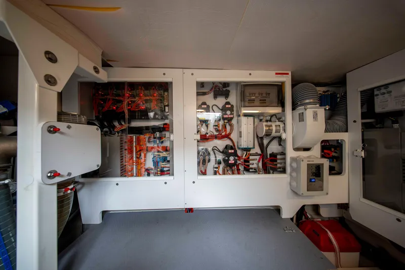 Seeworthy Yacht Photos Pics Electrical system inside a 2018 Prestige 560 yacht, showcasing wiring and components.