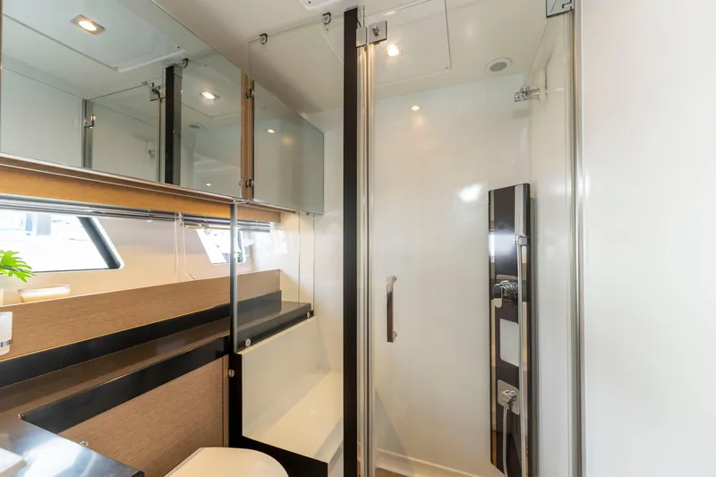 Seeworthy Yacht Photos Pics Luxurious bathroom interior of 2018 Prestige 560 yacht with modern fixtures and elegant design.