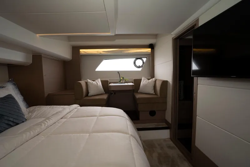 Seeworthy Yacht Photos Pics Luxurious interior of 2018 Prestige 560 yacht with cozy seating and modern decor.