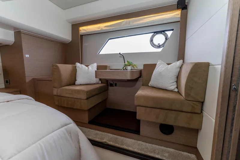 Seeworthy Yacht Photos Pics Luxurious interior of 2018 Prestige 560 yacht with cozy seating and modern decor.