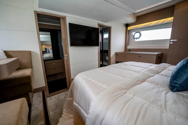 Seeworthy Yacht Photos Pics Luxurious bedroom interior of 2018 Prestige 560 yacht with modern furnishings.