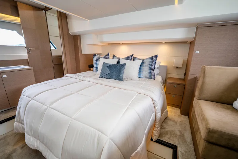 Seeworthy Yacht Photos Pics Luxurious bedroom interior of 2018 Prestige 560 yacht with plush bedding and modern design.