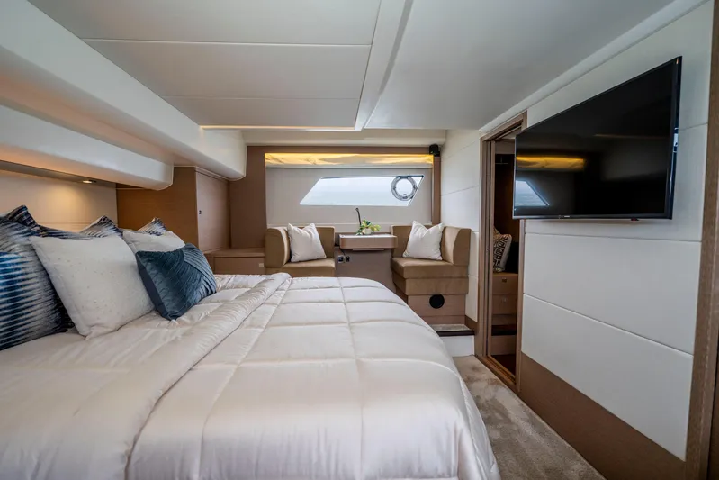 Seeworthy Yacht Photos Pics Luxurious 2018 Prestige 560 yacht bedroom with elegant decor and modern amenities.
