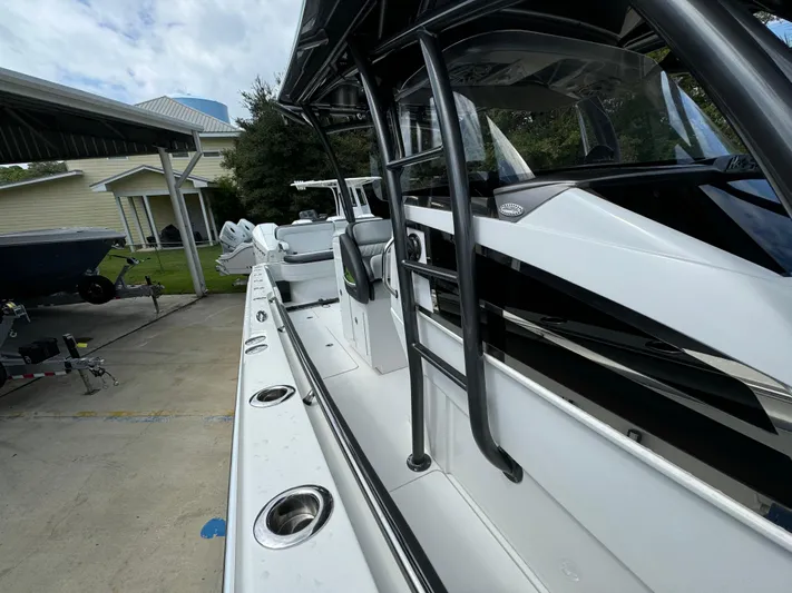  Yacht Photos Pics 2022 Nor-Tech 392 Super Fish boat, sleek design, docked outdoors.