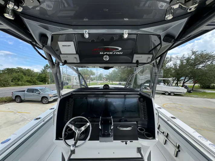  Yacht Photos Pics 2022 Nor-Tech 392 Super Fish boat cockpit with advanced navigation controls.