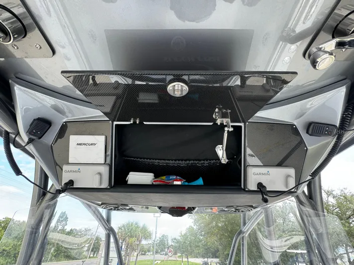  Yacht Photos Pics 2022 Nor-Tech 392 Super Fish dashboard with Garmin and Mercury electronics.