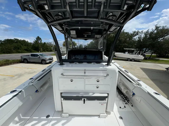  Yacht Photos Pics 2022 Nor-Tech 392 Super Fish boat interior with storage and seating.